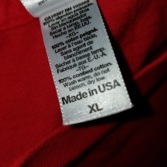 A Coca Cola tee shirt. - Picture 2 of 3
